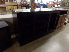 Dark wood shelves with a brown marble top
$125.00