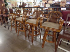 SET OF RATAN BAR STOOLS.  Strong natural ratan, cushioned seats and wicker accents on backs.  Set of 4
$168.80