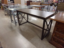 LIBRARY TABLE.  useful metal legs and hard formica style top.  
$175.00