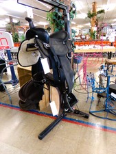 Tan suede Riding Saddle on the bottom.  
Find both saddles toward front of the store.  
$149.00