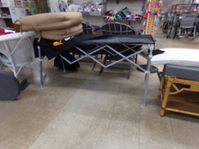 PORTABLE TABLE.  Pops out like the camping canopies!  Has a black skirt cover for flat top and a carry bag for storage.
$48.80