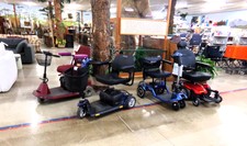 MOTOR SCOOTERS.  Featured here is a So-Lite in blue.  But come see the selection.  Surrounding KoCaMo our Kodiak bear
$527.40