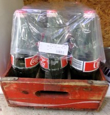Vintage Coke-a-cola crate full of large coke bottles
$40.00