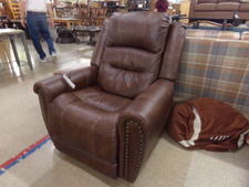 BROWN LEATHER POWER RECLINER.  
$601.00