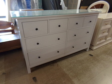 White dresser with a glass protective top
$375.00