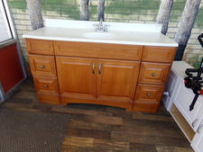 Bathroom vanity.  complete.  5 ft long.  Find in entryway by soda machine
$325.00