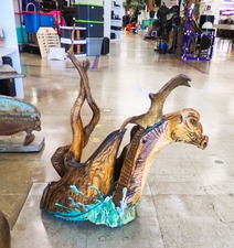 UNUSUAL DRAGON... this is large made of drift wood pieces.  Center is a round platform, like to hold a large planter?  Very unique and at front of store.
$275.00