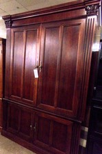 Dark wood large TV armoire
$146.30