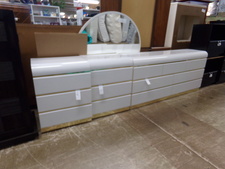 WHITE BEDROOM SET
A long dresser, 2 side tables, and a round mirror complete this set.  You'll see it as soon as you enter the store - to your right.
$335.50