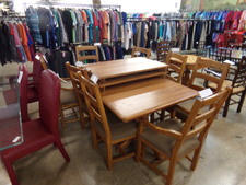 Oak LARGE FAMILY DINING.  This table is 6 ft long as shown.  Comes with 4 leaves and 8 high-back chairs.  
$995.00