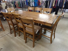 BAR-HIGH HARVEST TABLE.  natural wood 8 mid=-high chairs.  Ends of table will drop for smaller table.  
$1495.00
