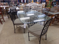 Glass table with 4 grey chairs
$318.80