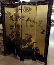 Oriental room divider
Gold and black bird and flowers on this side. 
Other side is black and green with lotus flowers and cranes.
$358.70