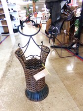 UMBRELLA STAND.  Of course could hold other items, but is very nice.  Possible antique.  Is at front of store
$30.00
